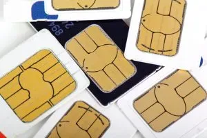 registrasi SIM, pengenalan wajah, NIK dan KK, registrasi ulang, keamanan data, mencegah penipuan, teknologi biometrik, sistem handphone, regulasi baru, nomor prabayar, identitas diri, verifikasi wajah, pendaftaran SIM, gerai resmi, penjualan pulsa, aktivitas ilegal, nomor terdaftar, kartu perdana